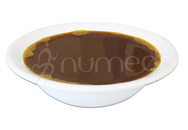 Molasses (carob) with Tahini in melamine bowl