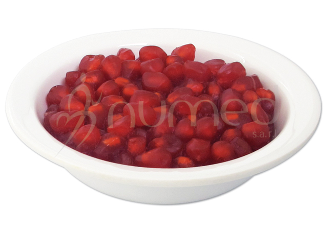 Pomegranate, raw, in melamine bowl