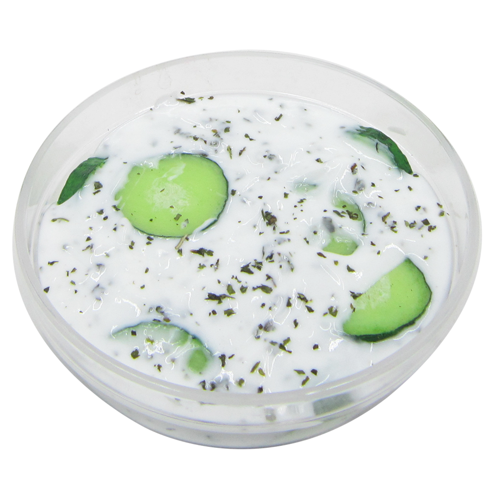 Cucumber yogurt salad, in melamine bowl